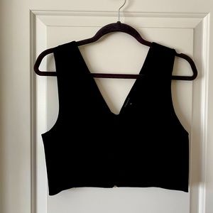 Dynamite black crop top with gold zipper back.